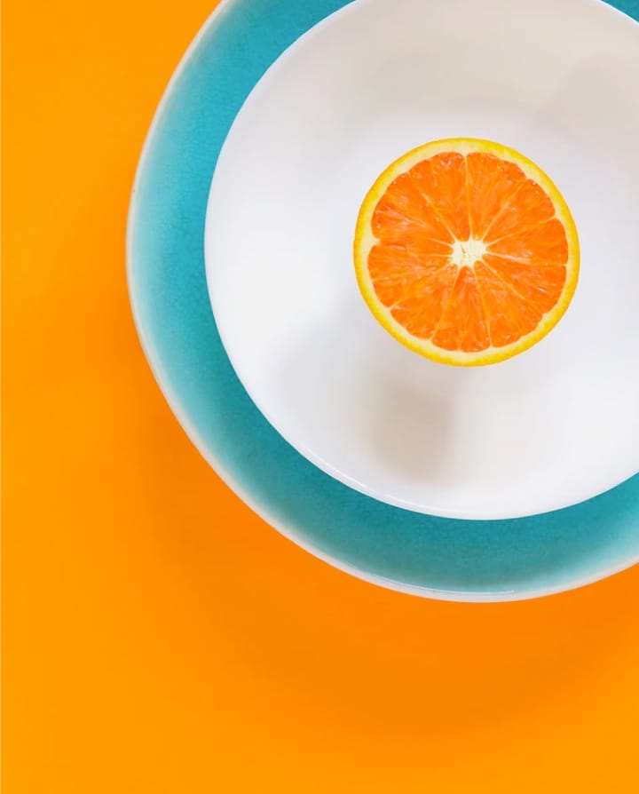 orange half on a plate